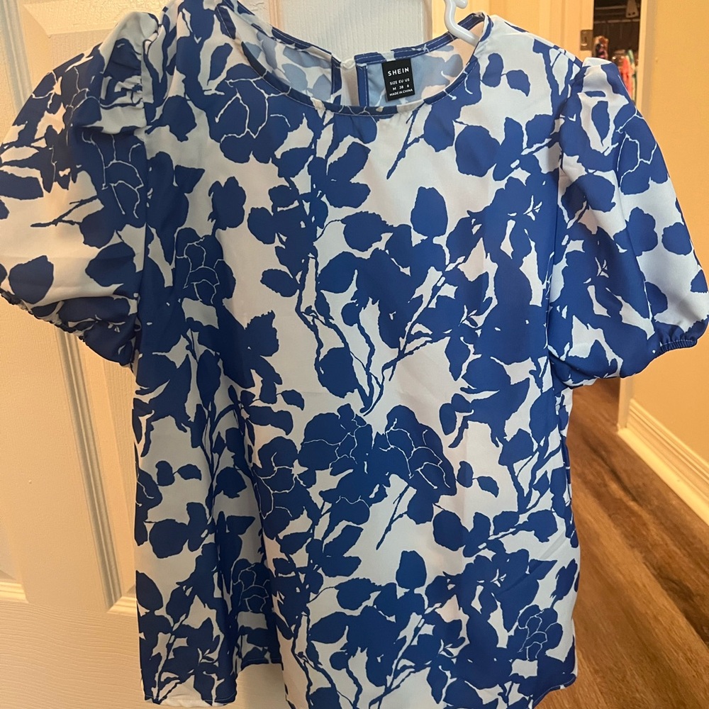 Blue and white floral blouse